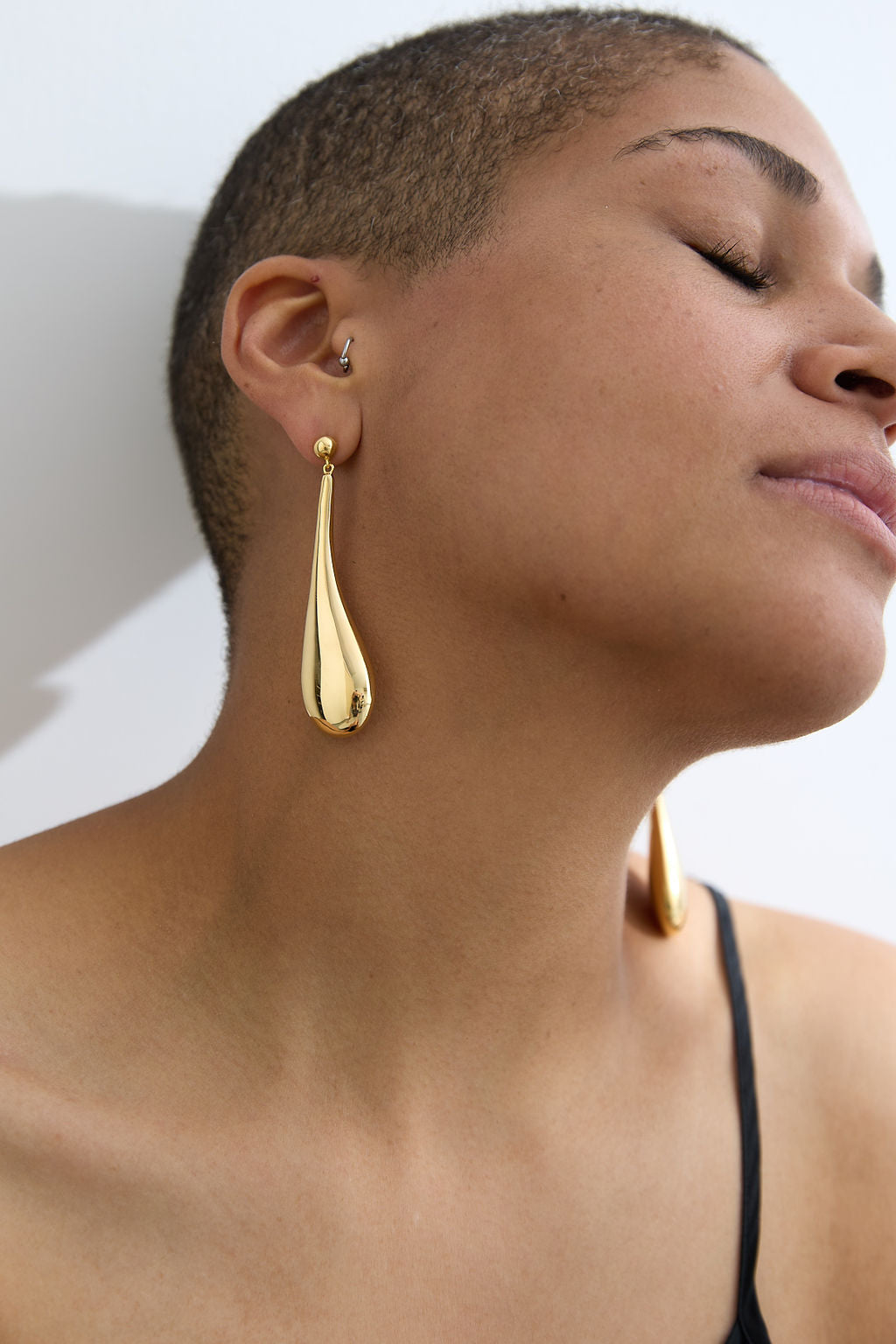 Long Hollow Form Tear Drop Earrings