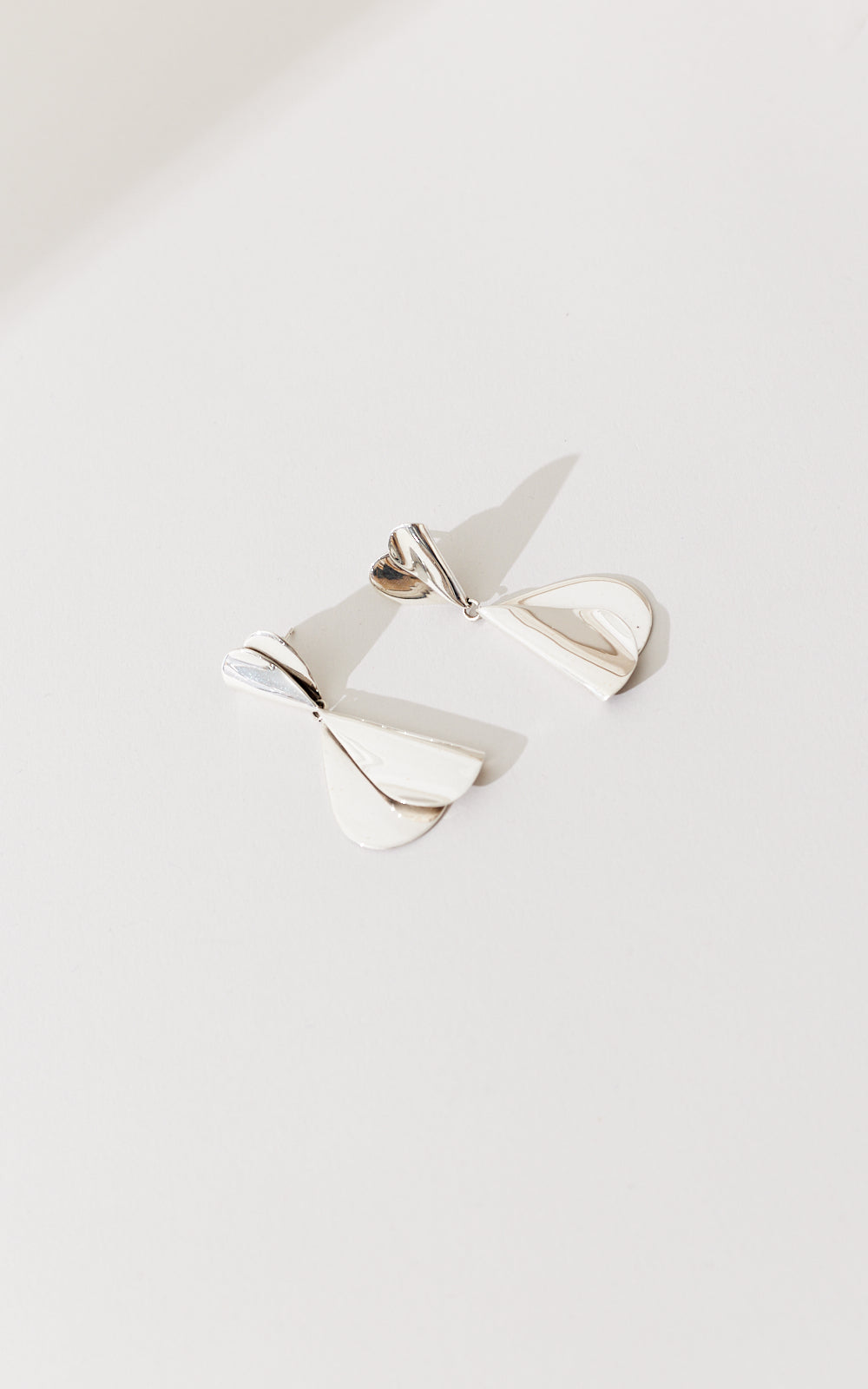 FOLDED HEARTS DROP EARRINGS