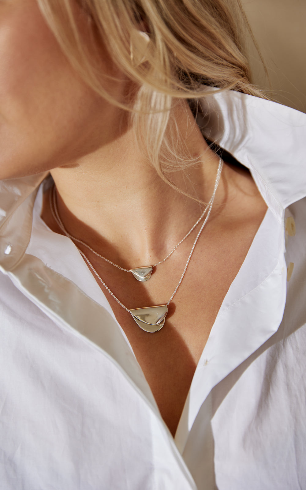 LARGE FOLDED HEARTS PENDANT