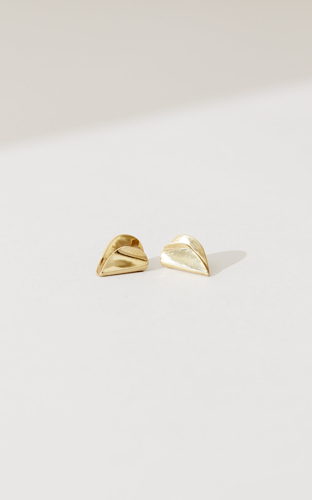 SMALL FOLDED HEART STUDS