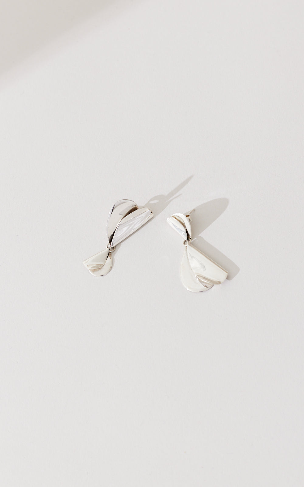 FOLDED HEARTS ASYMMETRICAL EARRINGS