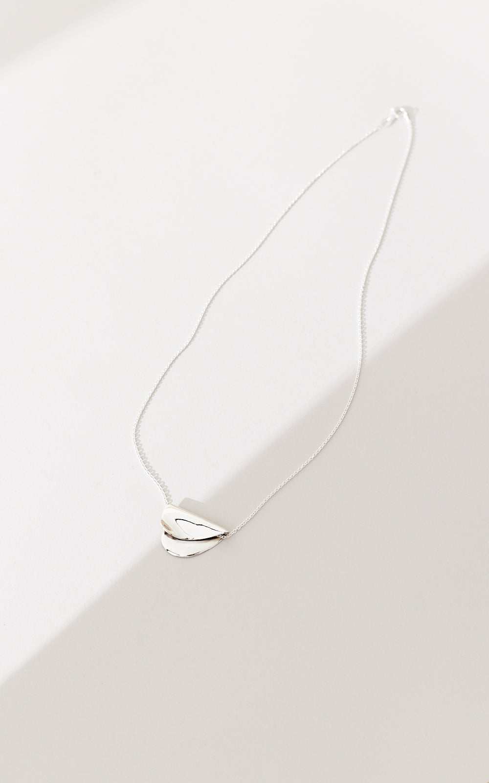 LARGE FOLDED HEARTS PENDANT