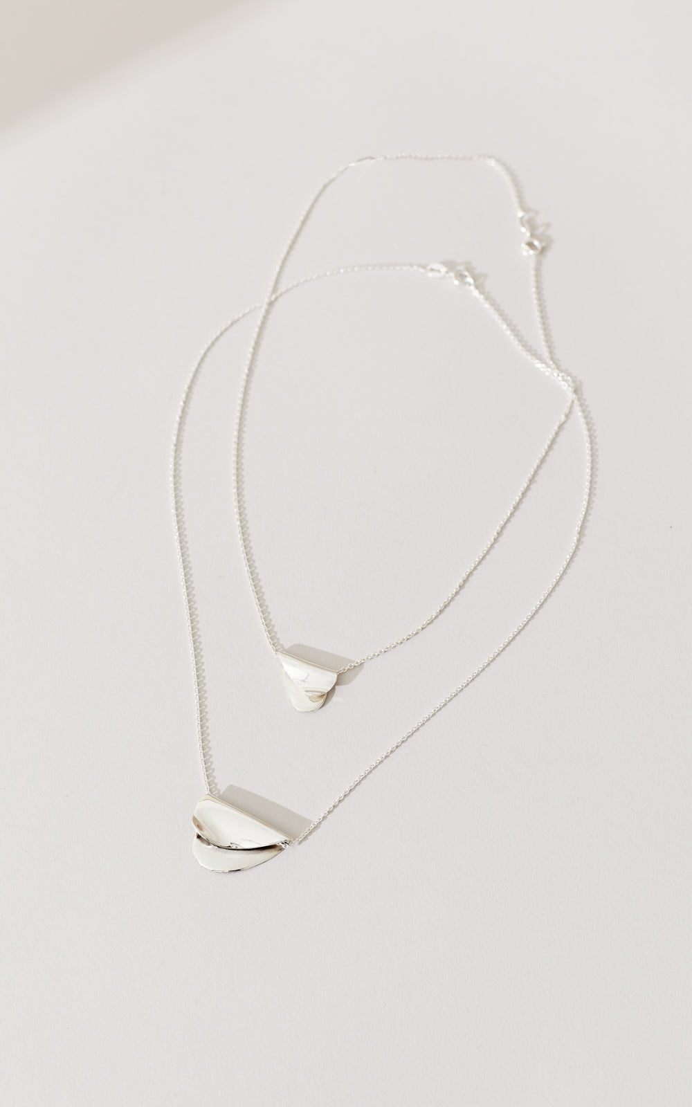 LARGE FOLDED HEARTS PENDANT